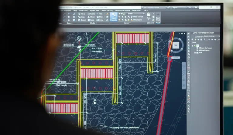 Civil engineer designs lightweight structures on computer screen